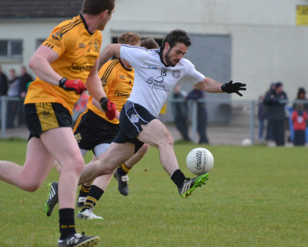 Jason McAnulla cuts through the Augher defence for an early goal in last Saturday's league opener.